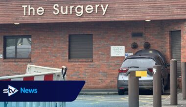 GP surgery and pharmacy evacuated after car crashes into building