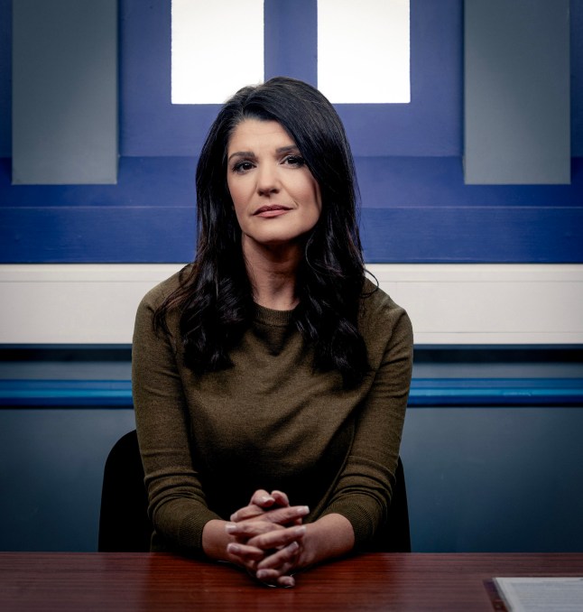 Danielle Silverton (Natalie Anderson) posing in a police station