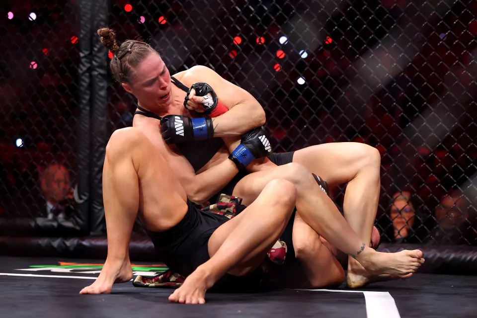 Ronda Rousey forces Gina Carano into an armbar submission in their featherweight bout during the main card of Netflix's Ronda Rousey vs. Gina Carano at Intuit Dome on May 16, 2026 in Inglewood, California