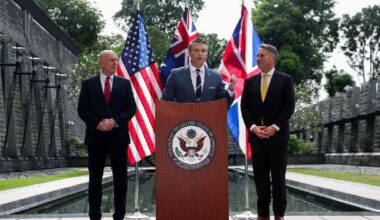 Australian Defence Minister Richard Marles and British Defence Secretary John Healey look on as US Secretary of Defense Pete Hegseth speaks during an AUKUS Defence ministers' press huddle at the U.S. Embassy in Singapore, May 30, 2026.