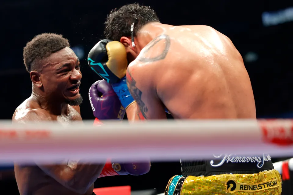 LAS VEGAS, NEVADA - SEPTEMBER 13: (L-R) Christian M'billi throws a hook at Lester Martinez in their middleweight WBC interim title fight during Netflix's Canelo v Crawford Fight Night at Allegiant Stadium on September 13, 2025 in Las Vegas, Nevada. (Photo by Steve Marcus/Getty Images)