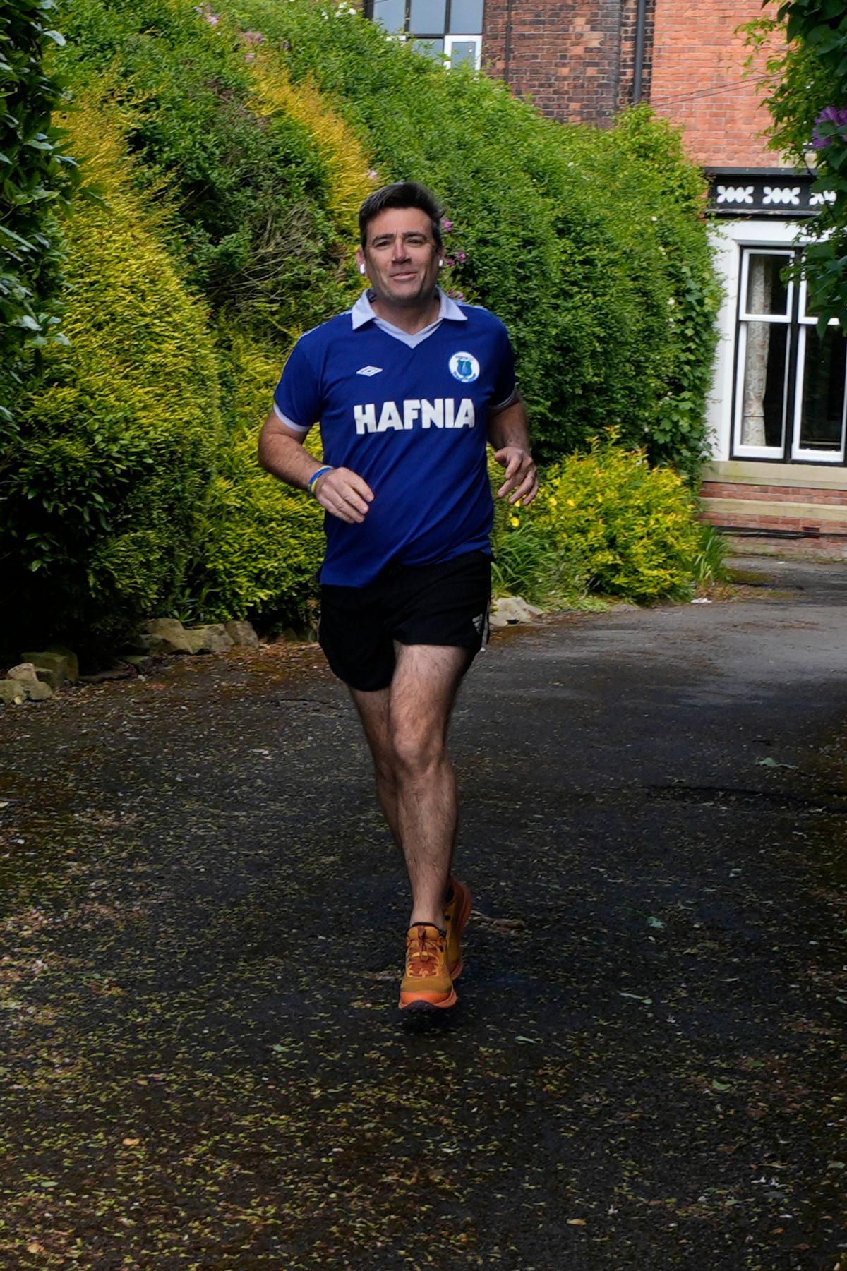 Andy Burnham pictured going for a run