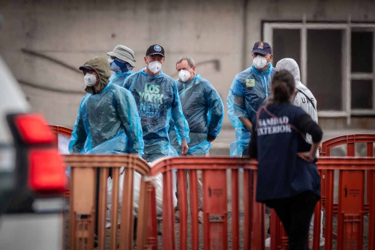 British passengers have disembarked from the MV Hondius and head by coach to the airport at Granadilla Port in Tenerife,