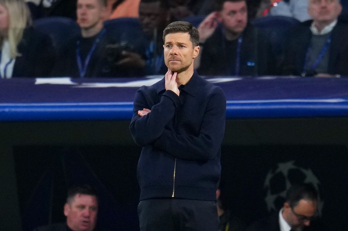 Xabi Alonso looks on during a match