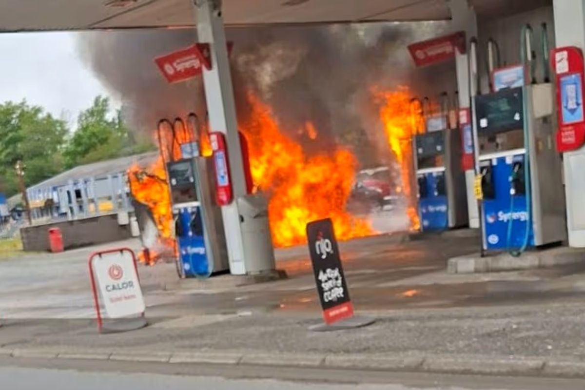 Vehicle on fire next to Esso fuel station on the A487 at Penrhyndeudraeth, Gwynedd