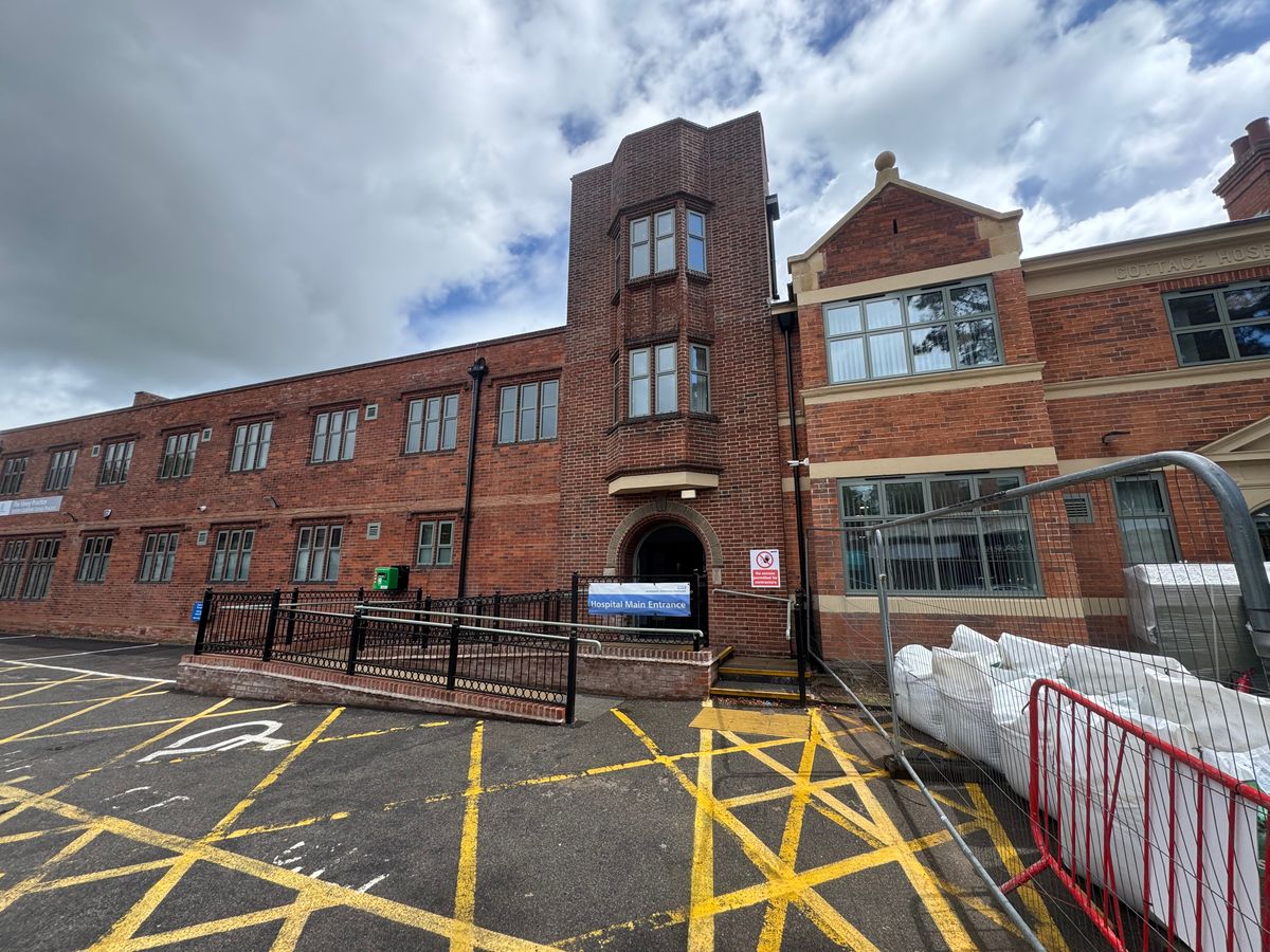 Sutton Cottage Hospital is still having the final touches applied on its £8.5 million refurbishment with barriers up around it and machinery visible - but not for long
