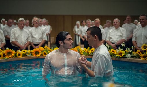 Two men in a baptism pool