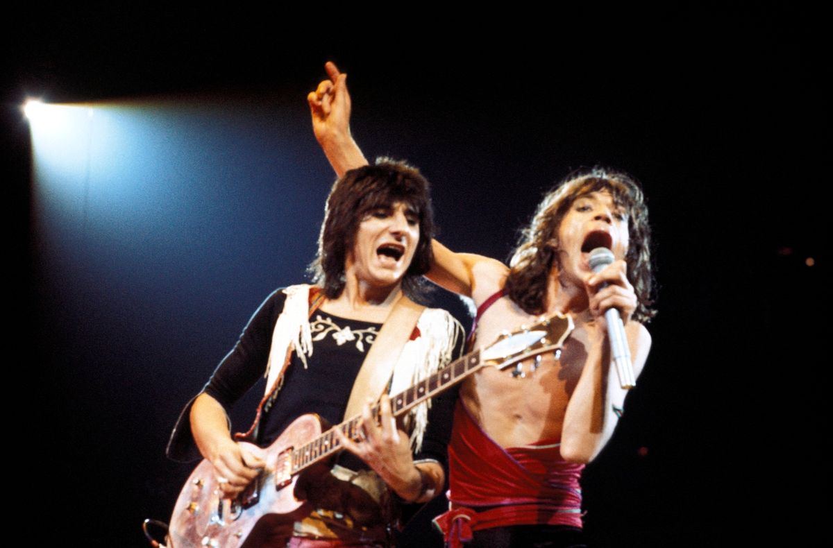 Ronnie Wood and Mick Jagger performing live on stage 