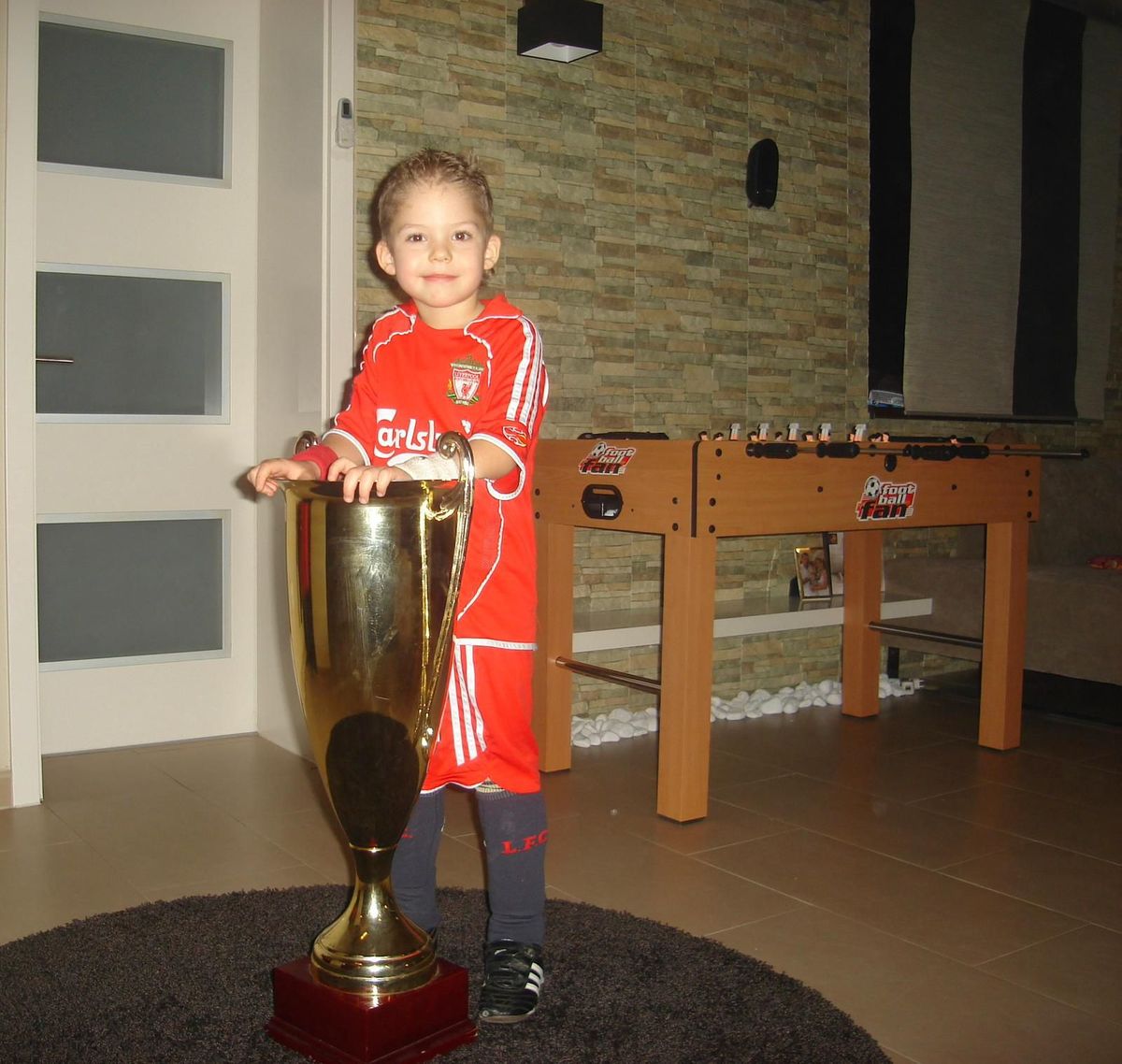 Liverpool goalkeeper Armin Pecsi in a Reds shirt when growing up