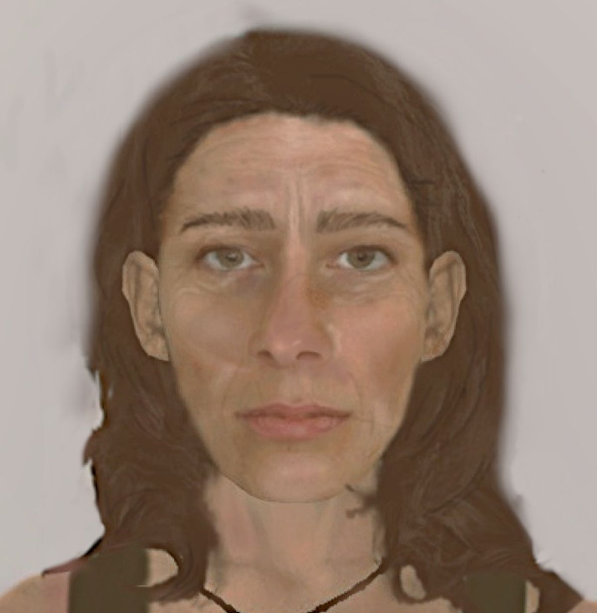 Police have shared this e-fit in hopes of identifying a woman found dead in Camborne woodland