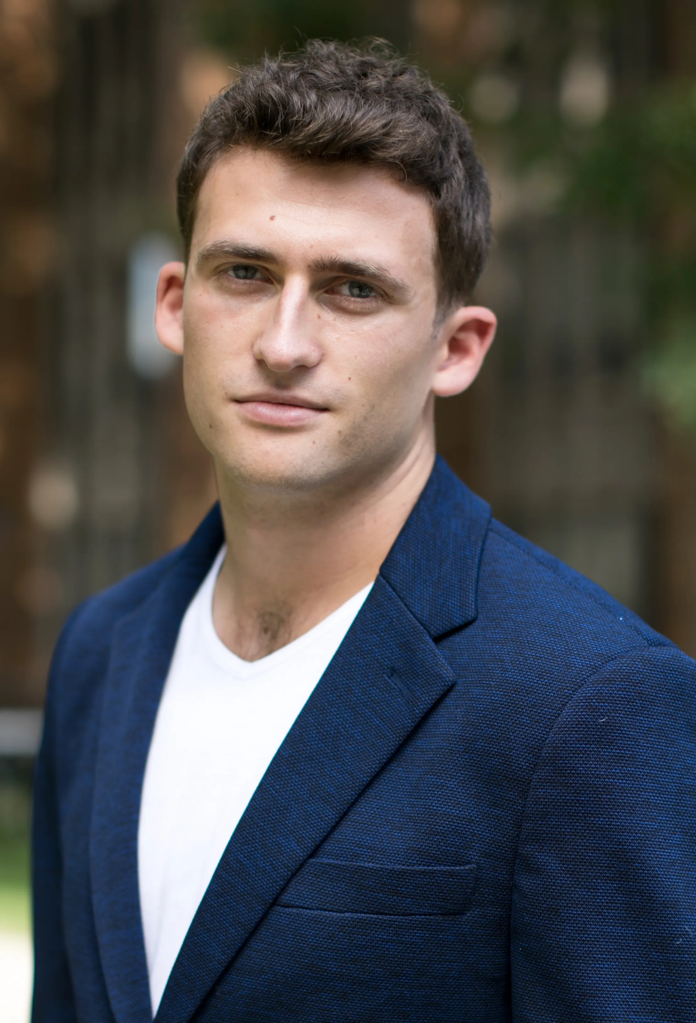 Headshot of Evan Davison Kotler, Director, Research & Health Security at Helena.