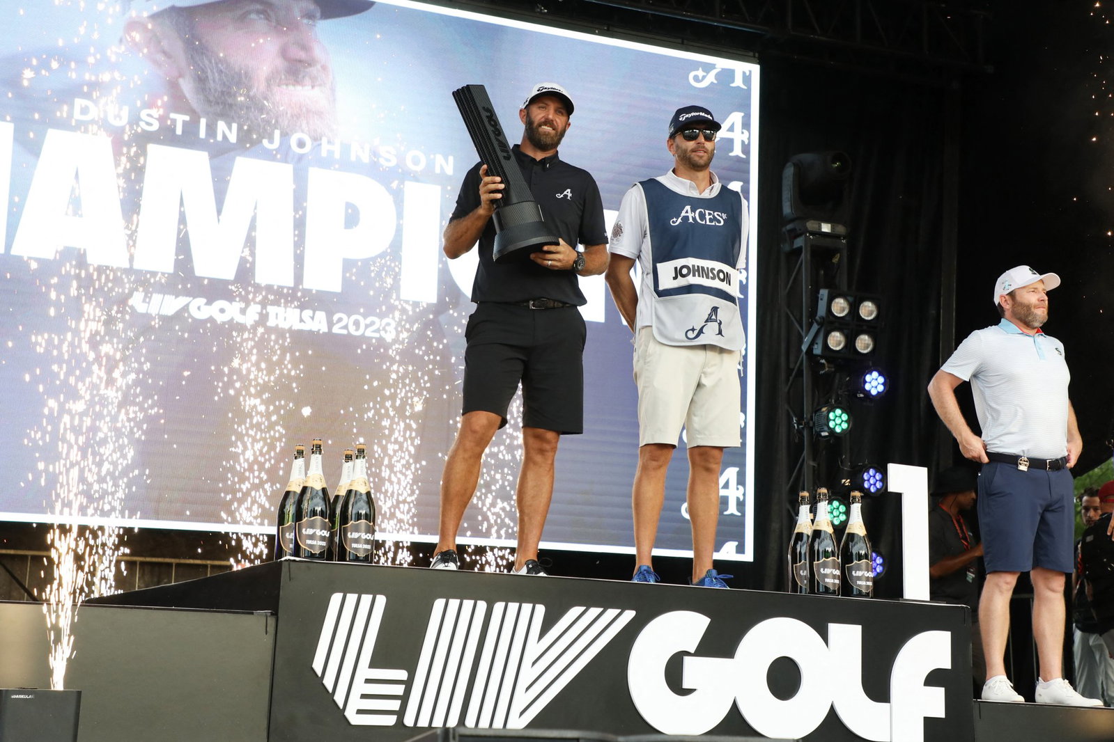 Dustin Johnson celebrates a LIV Golf win