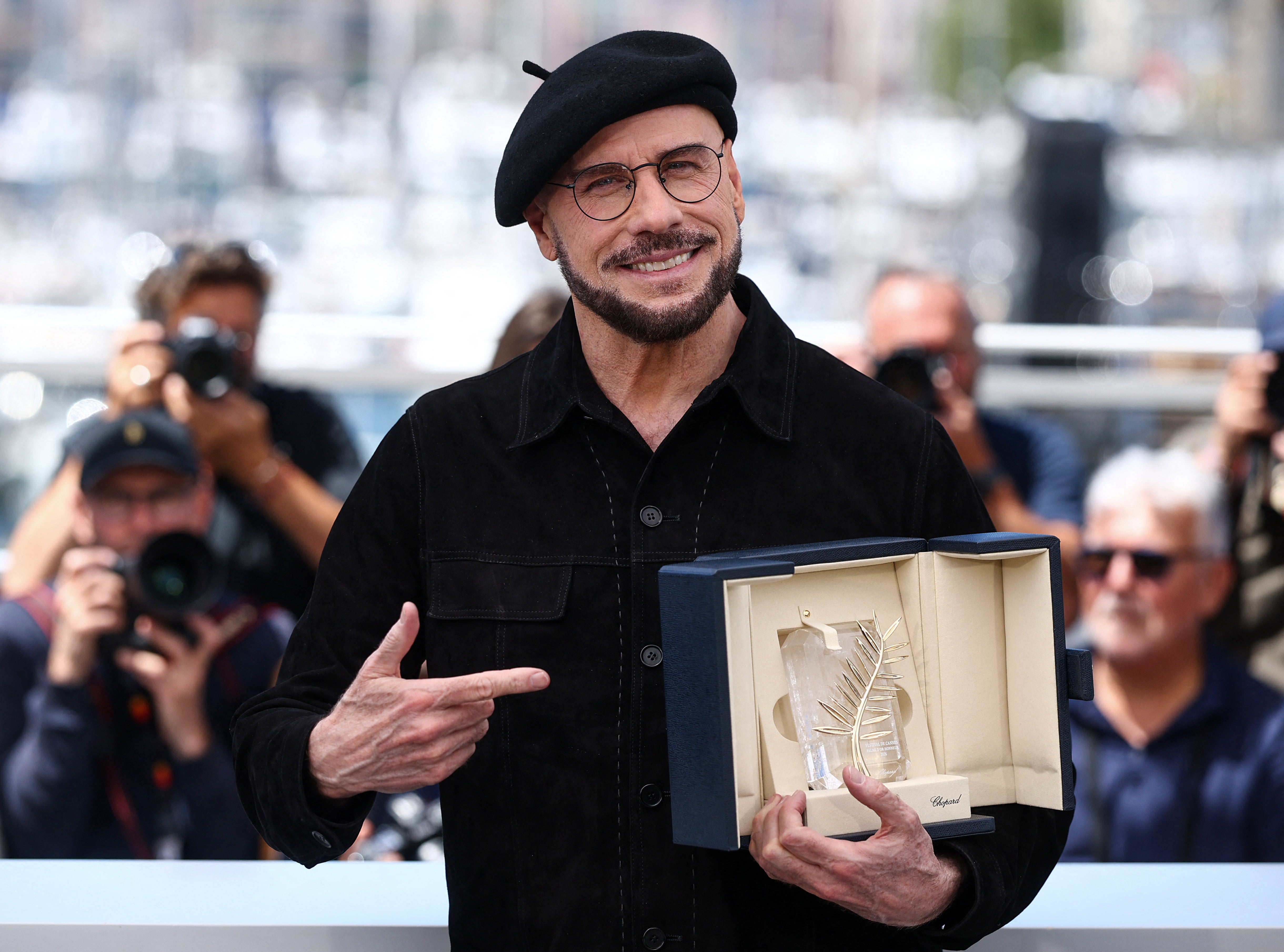 John Travolta was awarded the Honorary Palme d'Or at the 79th Cannes Film Festival
