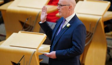 What is the white rose SNP MSPs are wearing in Holyrood?