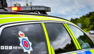 A close up shot of a Lancashire Police car