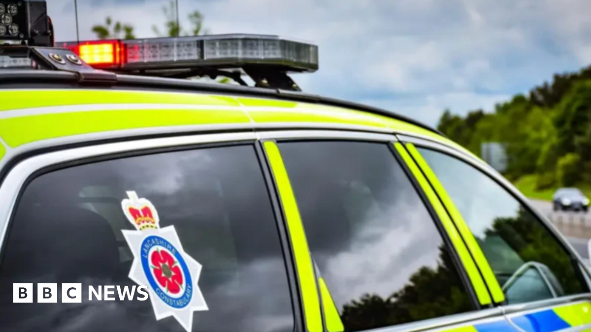 A close up shot of a Lancashire Police car