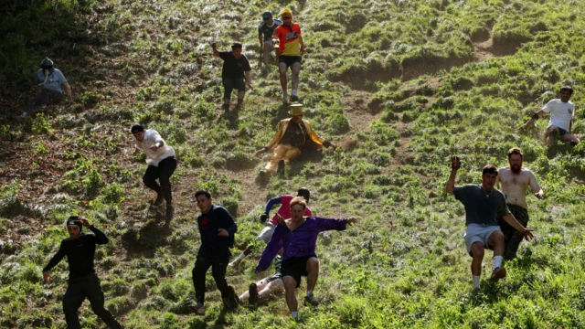 Men running down the hill.