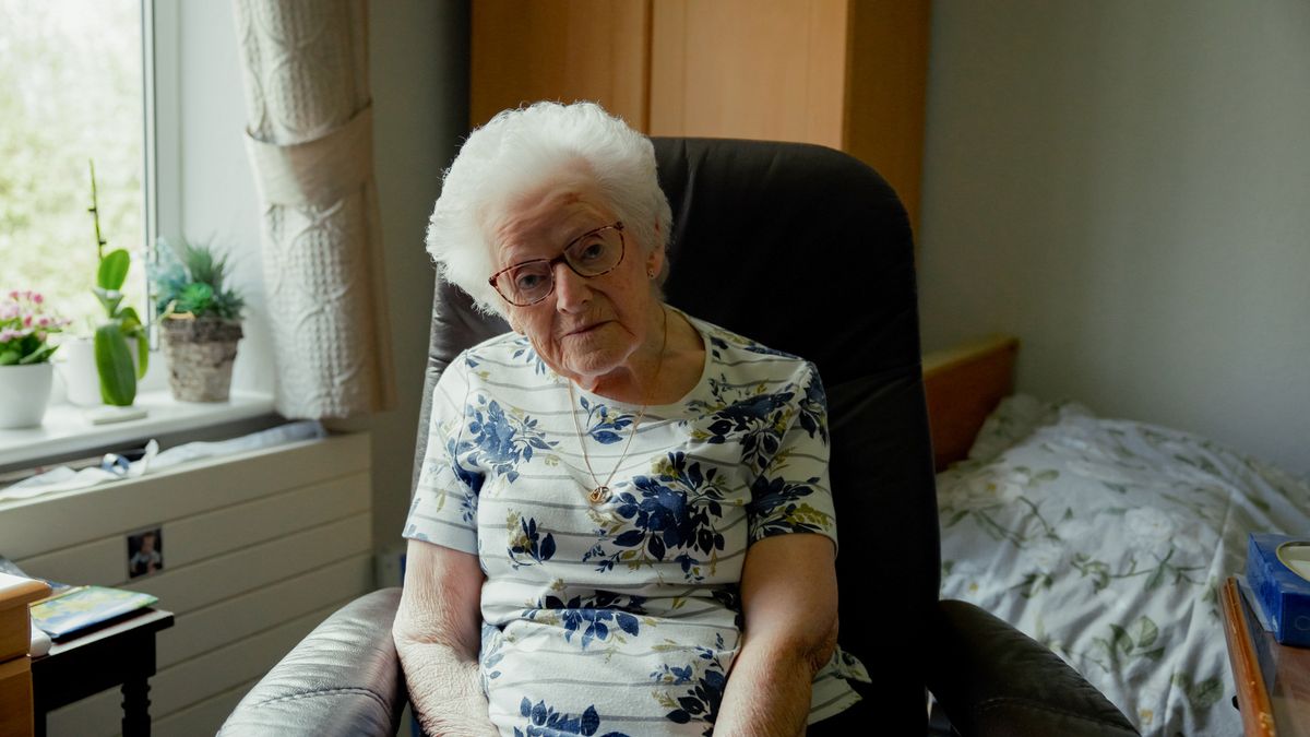 Dorothy Devereux sitting in a chair