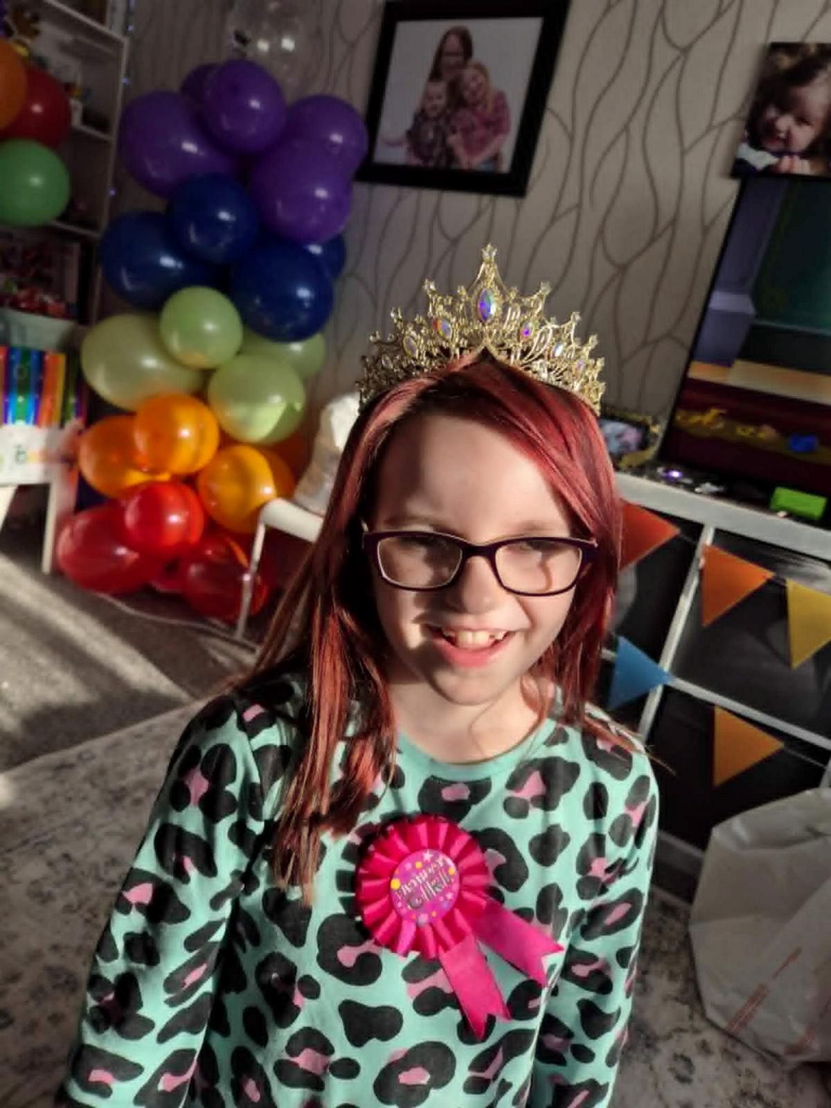 Millie Rose Hedley, smiling and wearing a tiara