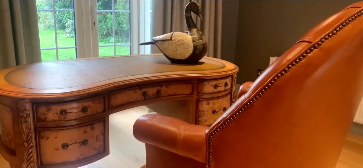 A sculpture on a desk