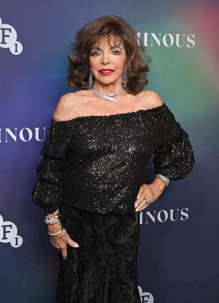 joan collins black gown