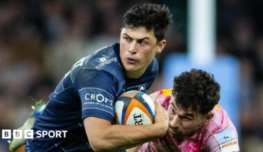Louis Rees-Zammit breaks out of a tackle for Bristol