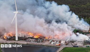 An aerial view of a large fire at a landfill site