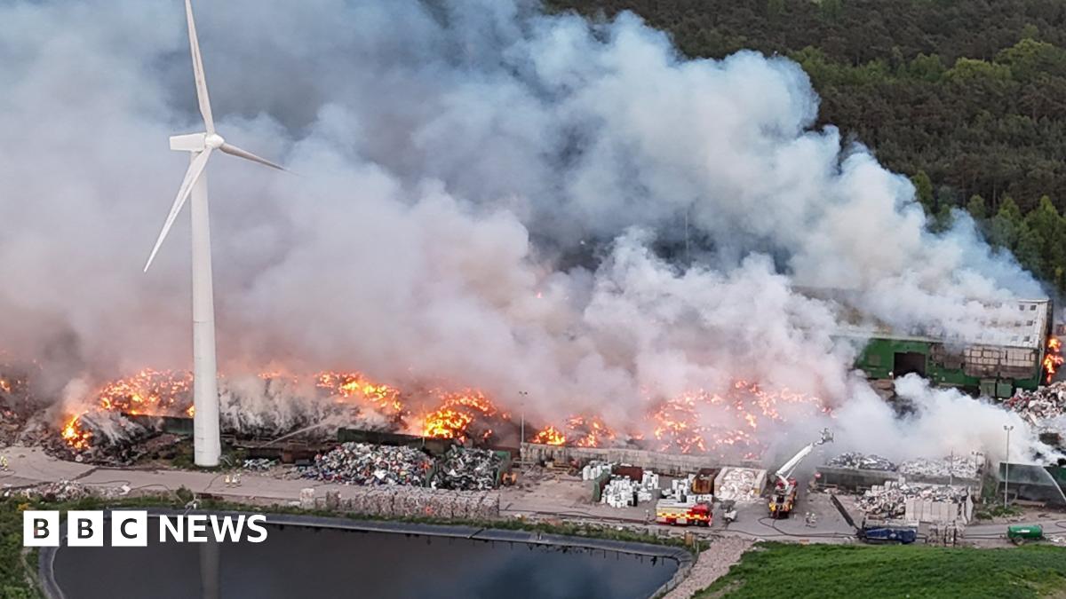 An aerial view of a large fire at a landfill site