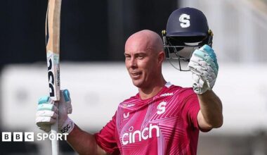 Northamptonshire batter Chris Lynn raises his bat and helmet as he celebrates scoring a century against Warwickshire, at Edgbaston on Sunday 31 May 2026