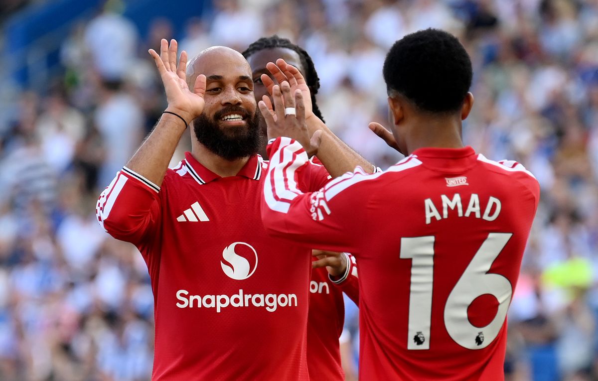 Bryan Mbeumo celebrating with Amad 