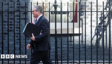 Prime Minister Keir Starmer walks outside 10 Downing Street on 22 April, 2026.