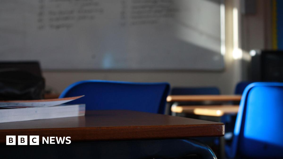 A stock image of a classroom.