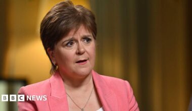 Sturgeon holds her finger up to the corner of her eye, appearing to wipe away a tear as she speaks to Laura Kuenssberg