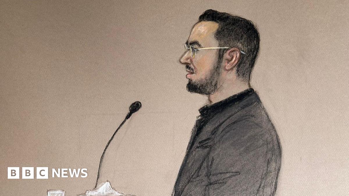 A court sketch of Pouria Zeraati giving evidence in the trial of two men accused of stabbing him. He has black hair and a black beard and is wearing a grey suit jacket.