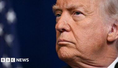 A close up shot of Donald Trump's face as he looks to the left