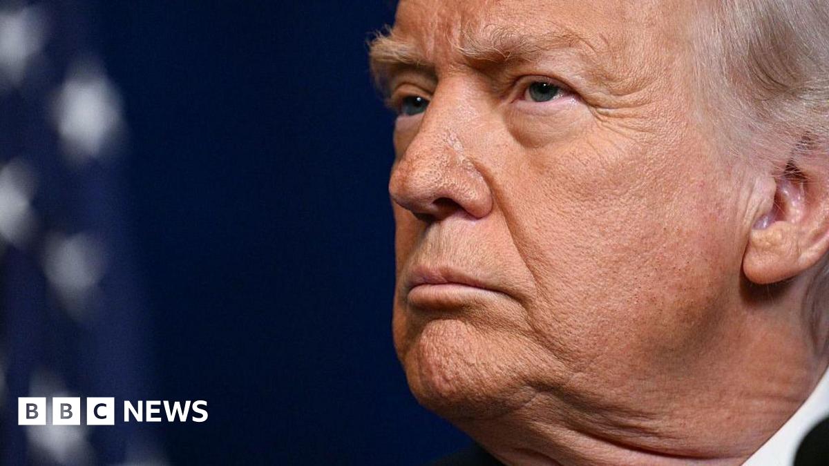 A close up shot of Donald Trump's face as he looks to the left