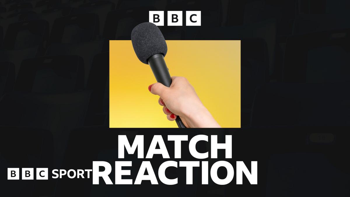 Referee Michael Salisbury signals before he awards a second goal to Matheus Cunha of Manchester United after a VAR check