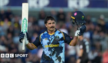 Glamorgan captain Kiran Carlson celebrates reaching his hundred against Somerset.