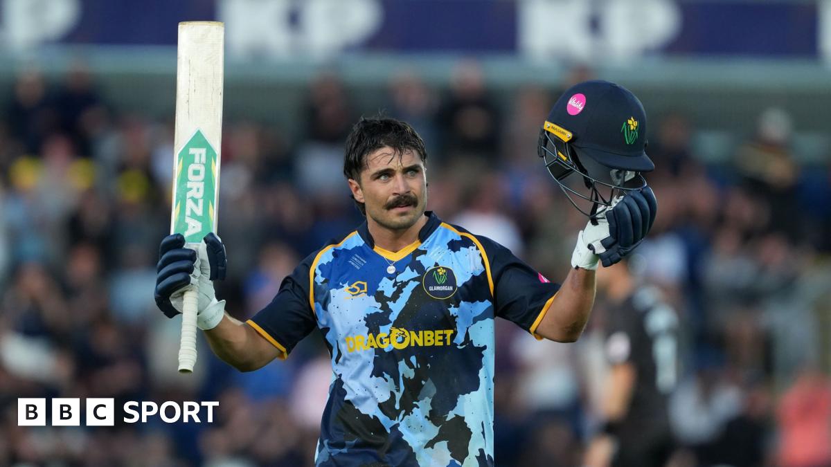 Glamorgan captain Kiran Carlson celebrates reaching his hundred against Somerset.
