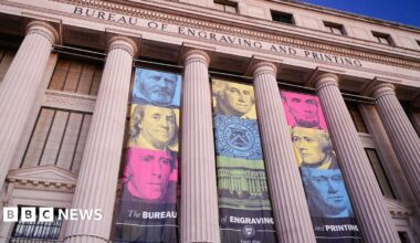 Banners hang from the front of the Bureau of Engraving and Printing headquarters building on January 19, 2026, in Washington, DC