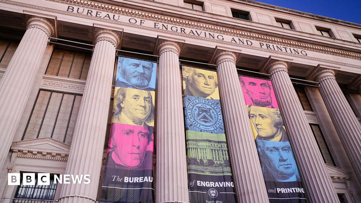 Banners hang from the front of the Bureau of Engraving and Printing headquarters building on January 19, 2026, in Washington, DC