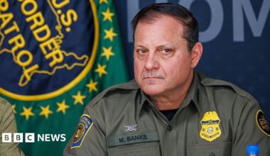 Michael Banks in uniform with his Customs and Border Patrol badge