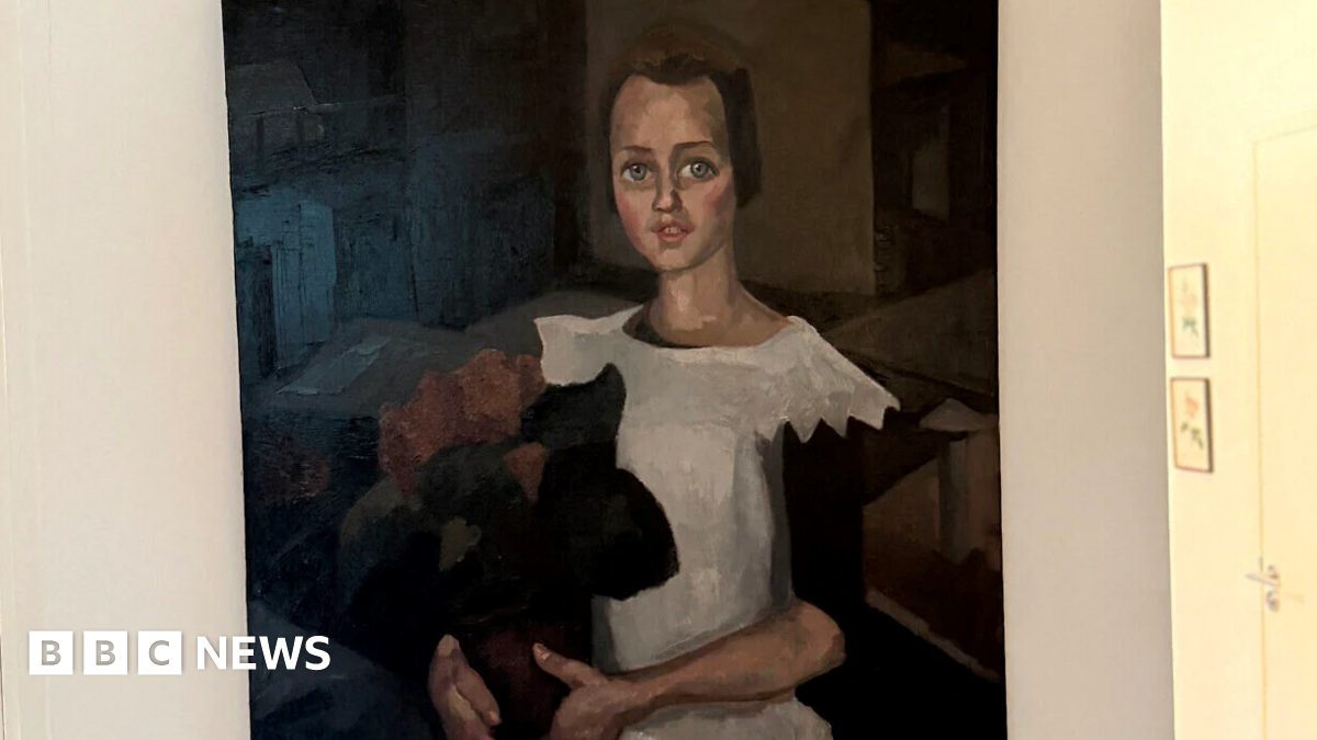 A painting believed to be Toon Kelder's 'Portrait of a Young Girl' shows a girl in a white dress with black sleeves holding what appears to be a bouquet of red flowers. She has brown hair and blue eyes and is sitting.