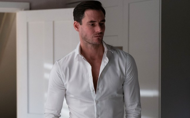 Zack standing in the kitchen of his home in EastEnders