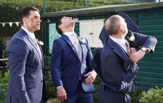 Ross elbows Zack in front of Mark in EastEnders