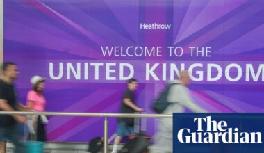 Net migration to UK falls by nearly 50% after Labour’s vow to cut numbers | Immigration and asylum