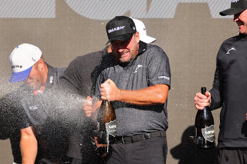 Talor Gooch, Brooks Koepka, Graeme McDowell and Jason Kokrak celebrate after winning during day three of the LIV Golf Invitational in 2024. Photograph: Michael Reaves/Getty Images