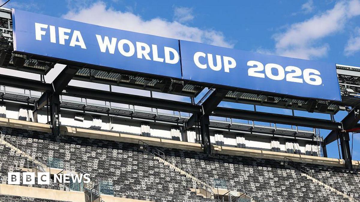 A sign reading Fifa World Cup 2026 is displayed in a stadium