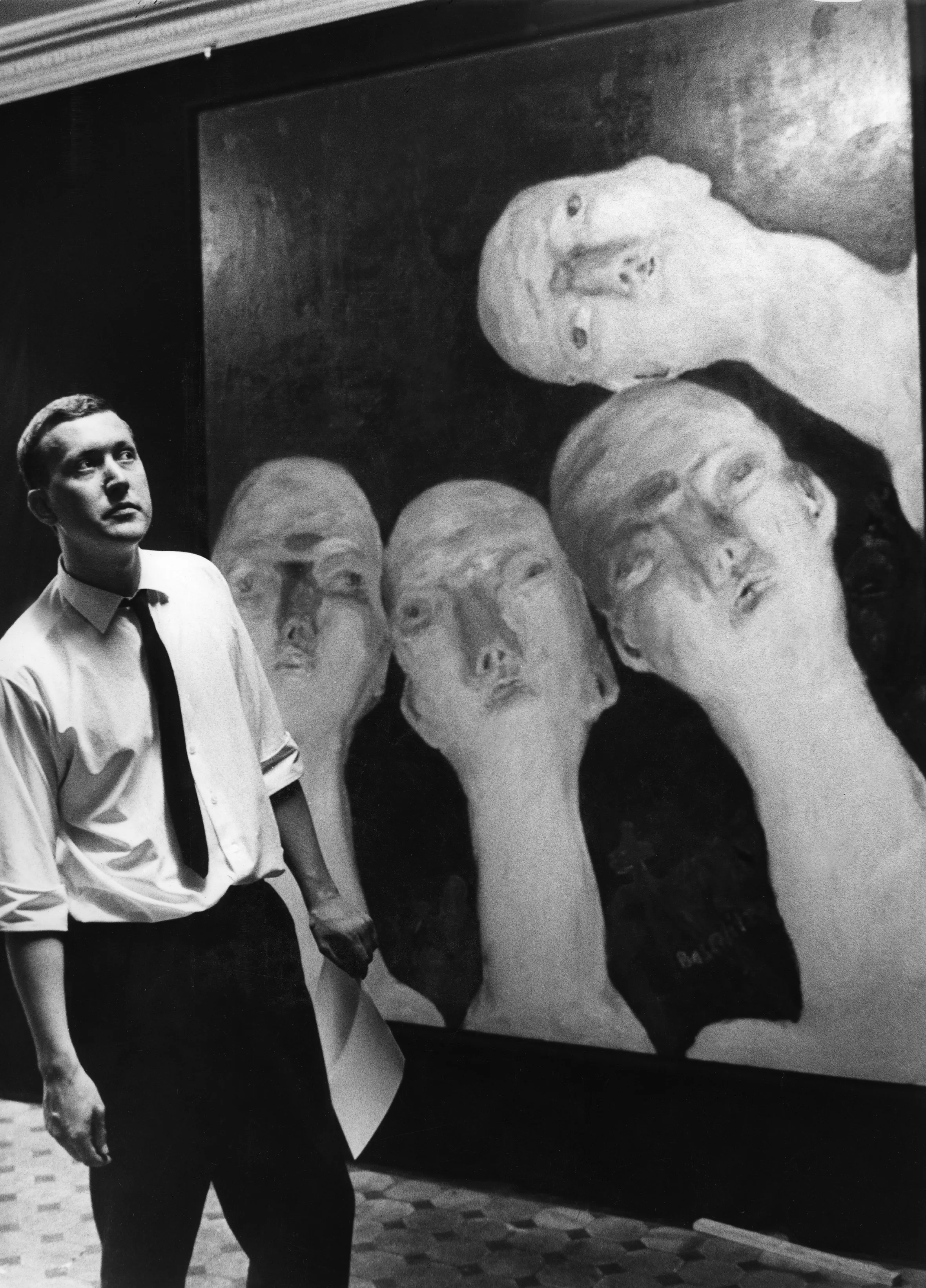 Art dealer Michael Werner standing in front of Georg Baselitz's painting 'Oberon.'