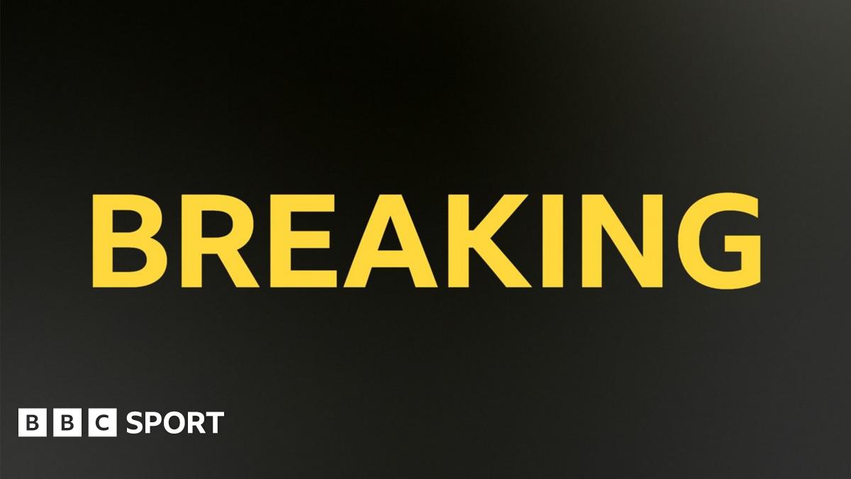 BBC Sport breaking news image. Breaking written in yellow capital letters on a black background.